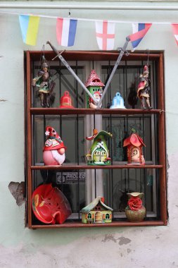 Different decorative objects with specific theme found in a house in Sighisoara , Romania