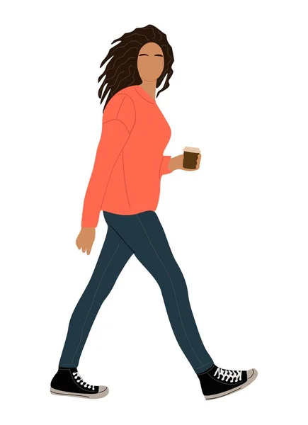 女孩一边走一边看 现代女性穿着街头时尚休闲装 牛仔裤和橙色毛衣 还有一杯咖啡 在透明背景下孤立的矢量现实说明 — 图库矢量图片