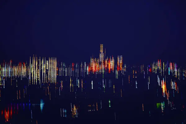 Abstract skyscrapers at night. Modern neon city, scenic light bokeh, blurred focus, modern background