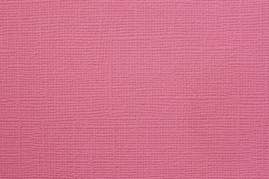 Dokulu pembe kağıt, dokunmuş desen ve yumuşak yüzey, doğal arka plan.