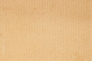 Doğal karton yüzey dokusu, geri dönüştürülmüş lifler ve ince dikey çizgiler. Çevre tasarımları ve modelleri için sıcak bej arka plan. Kağıt materyali kavramı