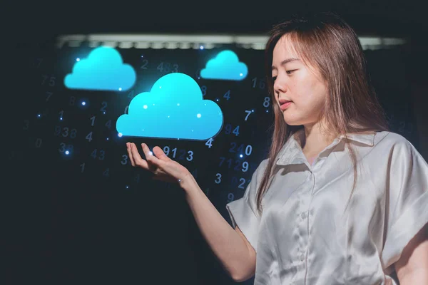 Businesswoman holding cloud computing icons. Cloud computing concept. Double exposure