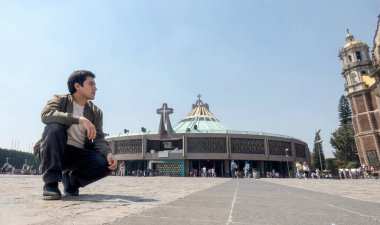 Man in Basilica of Santa Maria de Guadalupe, Catholic Church, pilgrimage site, CDMX, Mexico clipart