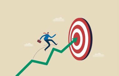 Hedefi vuruyorum. Hedef ya da hedefe ulaşmak. Dart oynayan iş adamı hedefi vuruyor..