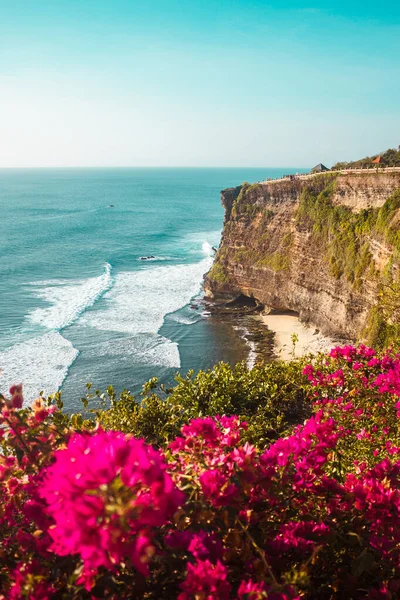 Sunset on the ocean coast, Uluwatu beach, Bali, Indonesia. Waves and cliffs in Uluwatu. High quality photo