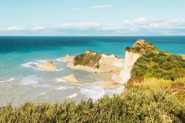 stock image Beautiful panoramic view of Cape Drastis on Corfu island in Greece and turquoise sea waves. High quality photo