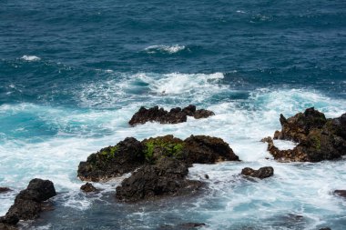Rocks in the breakers on the coast of the Canary Island of Tenerife, Spain