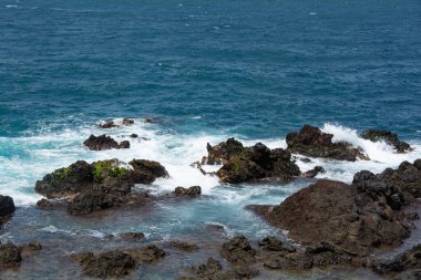 Rocks in the breakers on the coast of the Canary Island of Tenerife, Spain