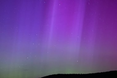 Kuzey ışıkları ve yıldızlar gece gökyüzünde, Almanya hakkında