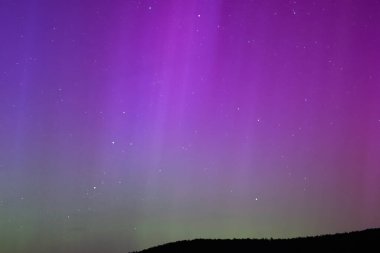 Kuzey ışıkları ve yıldızlar gece gökyüzünde, Almanya hakkında