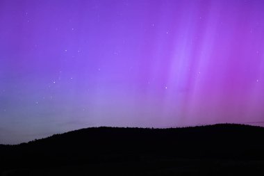 Kuzey ışıkları ve yıldızlar gece gökyüzünde, Almanya hakkında