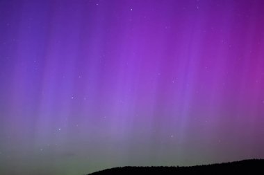 Kuzey ışıkları ve yıldızlar gece gökyüzünde, Almanya hakkında