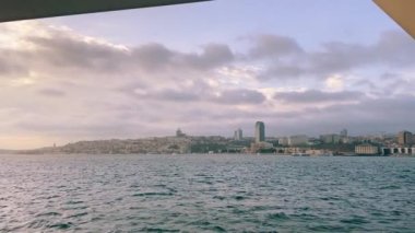 Beautiful sunset overlooking istanbul, sun glare reflected in the water. beautiful sunset in istanbul