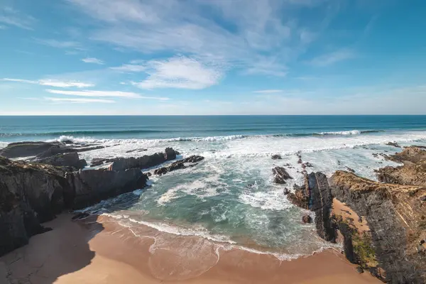 stock image View of the rocky outcrops rising from the Atlantic Ocean in Odemira region, western Portugal. Wandering along the Fisherman Trail, Rota Vicentina.