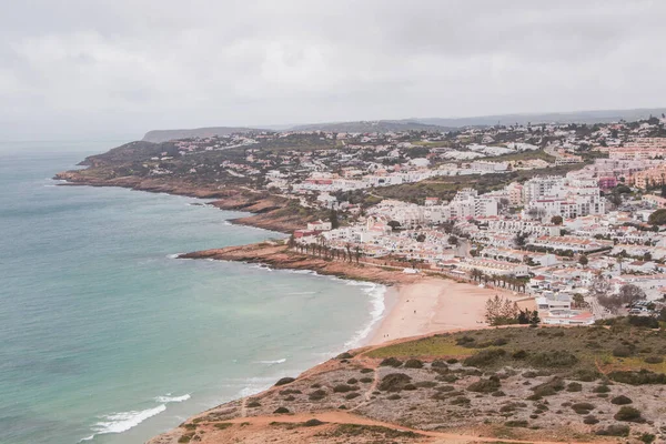 stock image View of the city of Luz and the Atlantic Ocean beaches from the top of Atalaia hill in the Algarve region of southern Portugal. Following in the footsteps of the Fisherman Trail. Rota Vicentina.