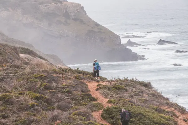 stock image Portugal's western coastline of rocky cliffs and sandy beaches in the Odemira region. Wandering along the Fisherman trail on rainy days.