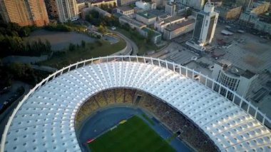 Kiev-Olympic Stadium. World Cup. Ukraine-Croatia. cityscape time of day night. The view from the top to the illuminated stadium with games and fans. Stadium