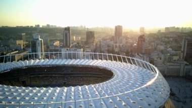 Kiev-Olympic Stadium. World Cup. Ukraine-Croatia. cityscape time of day night. The view from the top to the illuminated stadium with games and fans. Stadium