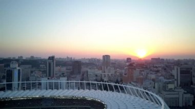 Kiev-Olympic Stadium. World Cup. Ukraine-Croatia. cityscape time of day night. The view from the top to the illuminated stadium with games and fans. Stadium