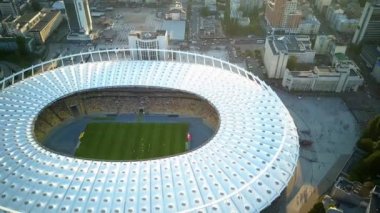 Kiev-Olympic Stadium. World Cup. Ukraine-Croatia. cityscape time of day night. The view from the top to the illuminated stadium with games and fans. Stadium