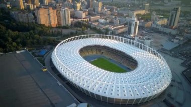 Kiev-Olympic Stadium. World Cup. Ukraine-Croatia. cityscape time of day night. The view from the top to the illuminated stadium with games and fans. Stadium