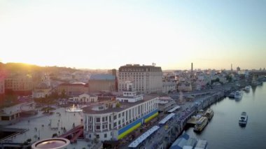 Beautiful panorama of the Hero city Kyiv, capital of Ukraine. view of the river station of the city of Kyiv. Dnieper river with bridges, beaches, ships, yachts. Many buildings and trees