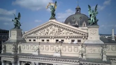 . Aerial drone of the Lviv Ukraine during a summer day with cars driving and the city skyline in the background, central part of the city of Lviv, Ukraine, drone flight 