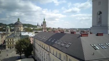 . Aerial drone of the Lviv Ukraine during a summer day with cars driving and the city skyline in the background, central part of the city of Lviv, Ukraine, drone flight 