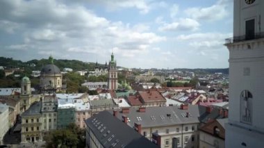 . Aerial drone of the Lviv Ukraine during a summer day with cars driving and the city skyline in the background, central part of the city of Lviv, Ukraine, drone flight 