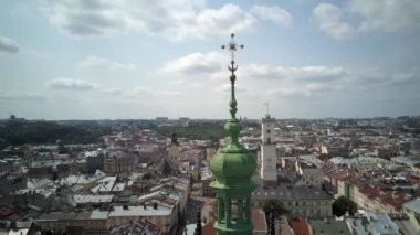 . Aerial drone of the Lviv Ukraine during a summer day with cars driving and the city skyline in the background, central part of the city of Lviv, Ukraine, drone flight 