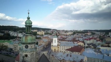 . Aerial drone of the Lviv Ukraine during a summer day with cars driving and the city skyline in the background, central part of the city of Lviv, Ukraine, drone flight 