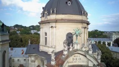 . Aerial drone of the Lviv Ukraine during a summer day with cars driving and the city skyline in the background, central part of the city of Lviv, Ukraine, drone flight 