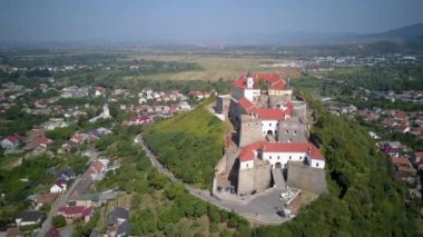 Beautiful view of the majestic castle Palanok, View of the castle walls in the city of Mukachevo. Palanok Castle. View from the top. Drone Video. Ukraine. Europe, 