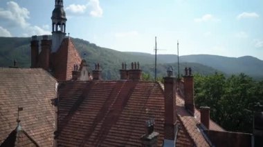  Shooting from a birds-eye view. Aerial view of castle Schonborn is one of the most beautiful and famous buildings in Carpathians, Ukraine. Eastern Carpathian Mountains, Transcarpathia
