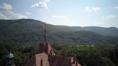  Shooting from a birds-eye view. Aerial view of castle Schonborn is one of the most beautiful and famous buildings in Carpathians, Ukraine. Eastern Carpathian Mountains, Transcarpathia