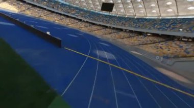 FPV uçuşu, Stadyum. Gece gündüz şehir manzarası. Yukarıdan aydınlık stadyuma kadar oyunlar ve taraftarlarla dolu bir manzara. Stadyum, Kiev, Ukrayna, Futbol stadyumu sahası, futbol arka planı, açık hava sporları 