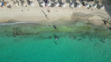 Aerial drone footage over Grote Knip in West Punt Curaca. Carribean beach drop down footage over the clear sea and sand. High quality 4k footage
