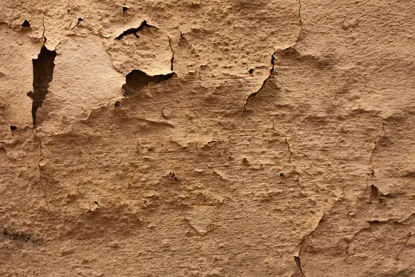 texture of old peeling paint, facade of the house