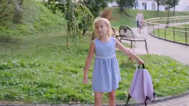 Small Child School Backpack Having Fun Street Happy Schoolgirl Playing — Stock Video
