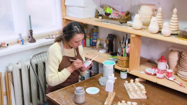 Girl Master Paints Wooden Toys Acrylic Paints Production Environmentally Friendly — Stock Video