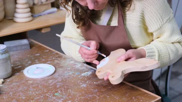 Artist Paints Handmade Wooden Toy Workshop — Stock Video