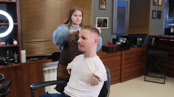 Girl Makes Hairstyle Young Guy Disabilities Apply Gloss Balm Her — Vídeos de Stock