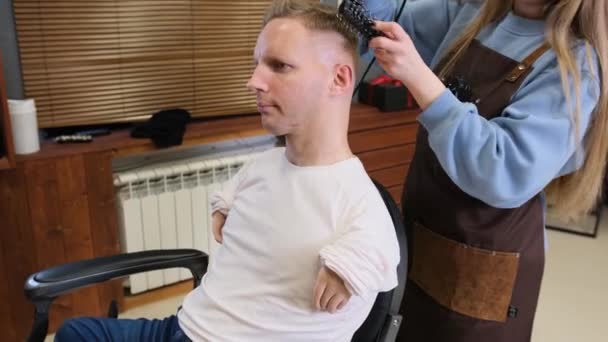Hairdresser Girl Makes Hairstyle Man Disabilities Dries His Head Does — Stock Video