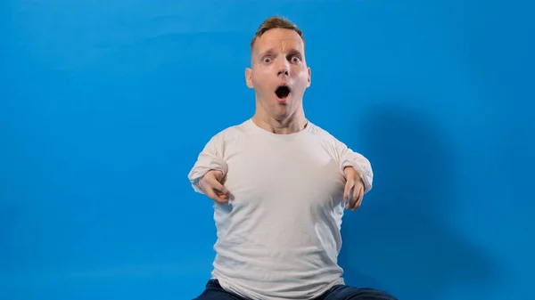 Young Man Disabilities Blue Background Afraid Shocked Surprise Astonished Expression — Stock Photo, Image