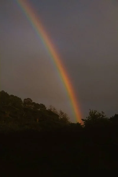 magic Rainbow behind the mountains