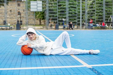young man is playing on the court