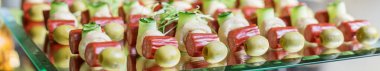catering buffet table with different appetizers. Italian and french dishes. Banner for site