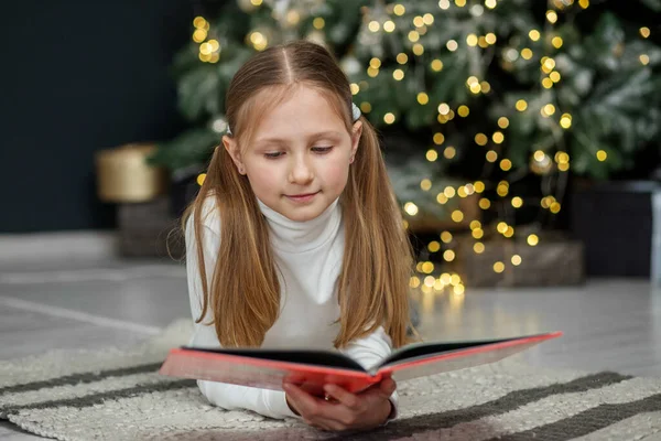 Smiling Child Reads Book Room Concept New Year Merry Christmas — Stock Photo, Image