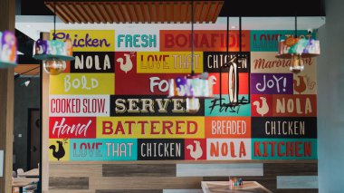 The interior design of the fast food restaurant Popeye in one of the places in Jakarta. clipart