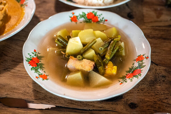 Tamarind vegetable menu. It is a soupy menu with a sour taste from tamarind containing vegetables: chayote, long beans, melinjo, and corn.